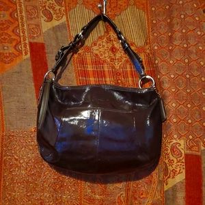 Patent leather purse.